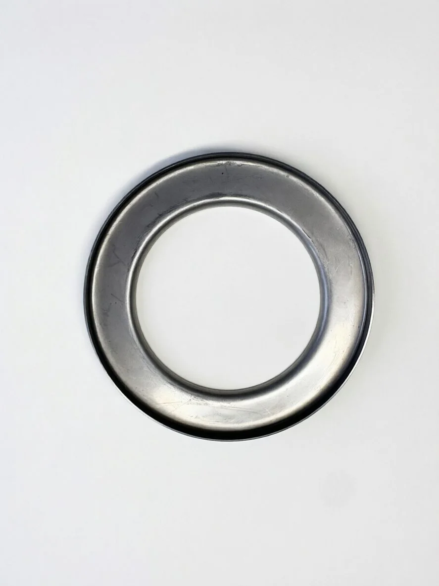Stamped machinery fitting